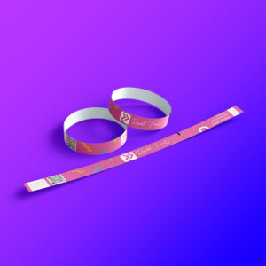 Neon pink custom paper wristband with black logo for event security in Riyadh Saudi Arabia.