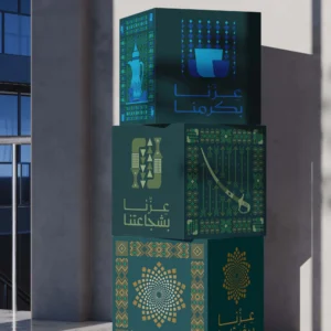 Saudi national day decor cubes stacked in an office lobby with sadu pattern print